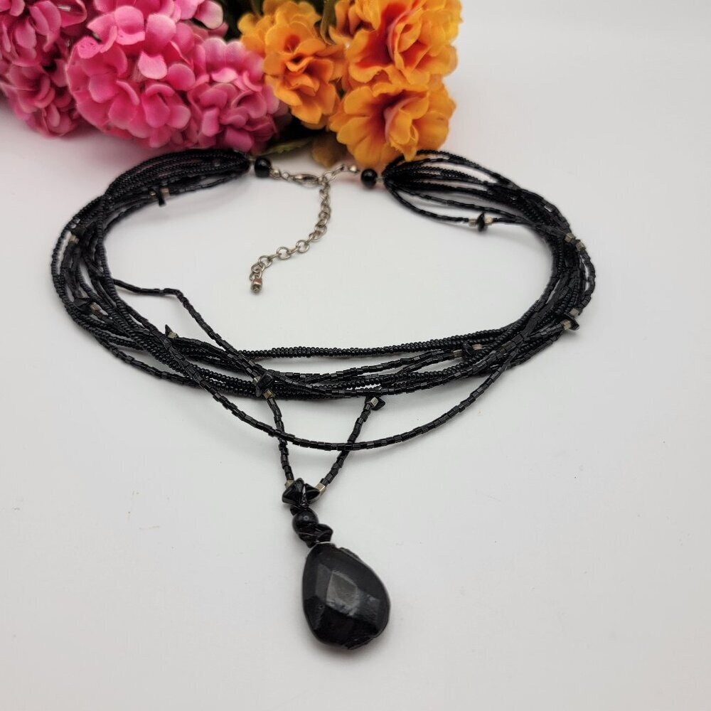 Black Multi-Strand Beaded Necklace with Faceted Teardrop Pendant